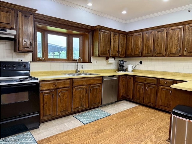 42096 Cadiz Dennison Rd, Cadiz, OH 43907 - kitchen with black range with electric cooktop, dishwasher, a sink, light countertops, and dark brown cabinetry