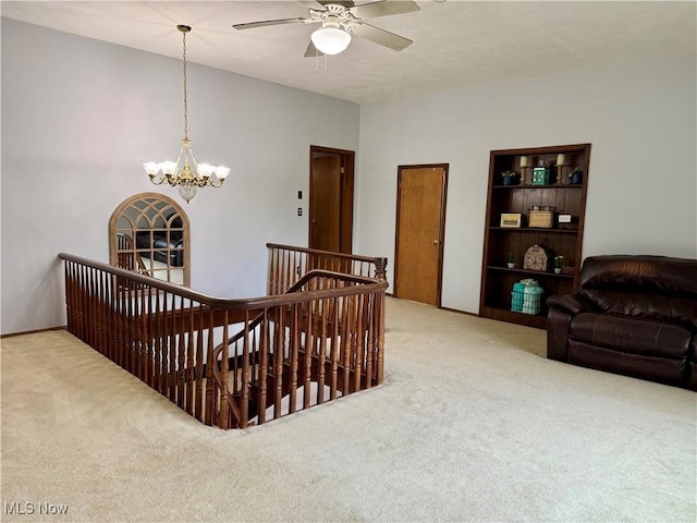 42096 Cadiz Dennison Rd, Cadiz, OH 43907 - corridor featuring carpet floors, an upstairs landing, and a chandelier