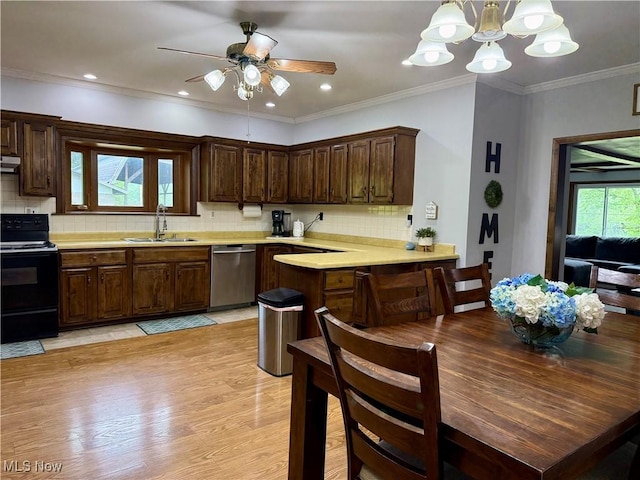 42096 Cadiz Dennison Rd, Cadiz, OH 43907 - kitchen featuring stainless steel dishwasher, black range with electric stovetop, a sink, light countertops, and ornamental molding