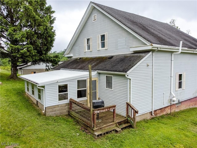 42096 Cadiz Dennison Rd, Cadiz, OH 43907 - rear view of property with a shingled roof, a deck, and a lawn
