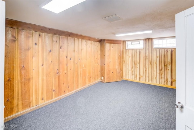 21411 Clare Ave, Maple Heights, OH 44137 - basement featuring wooden walls and carpet floors