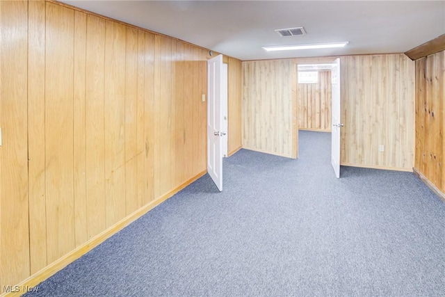 21411 Clare Ave, Maple Heights, OH 44137 - basement with wooden walls and carpet floors