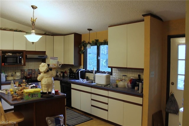 635 N Hametown Rd, Akron, OH 44333 - kitchen featuring dark countertops, black appliances, backsplash, hanging light fixtures, and a textured ceiling