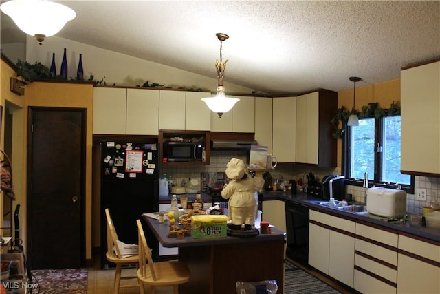 635 N Hametown Rd, Akron, OH 44333 - kitchen with black appliances, dark countertops, backsplash, decorative light fixtures, and vaulted ceiling