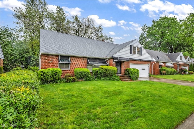 313 E 244th St, Euclid, OH 44123 - view of front of property with brick siding, asphalt driveway, a front yard, and roof with shingles