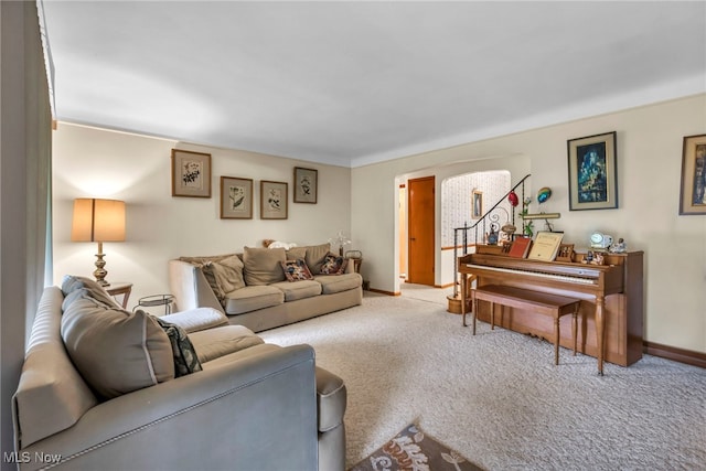 313 E 244th St, Euclid, OH 44123 - carpeted living room featuring baseboards
