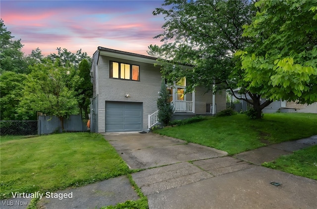 1654 Vicgross Ave, Akron, OH 44310 - view of front of home featuring an attached garage and concrete driveway