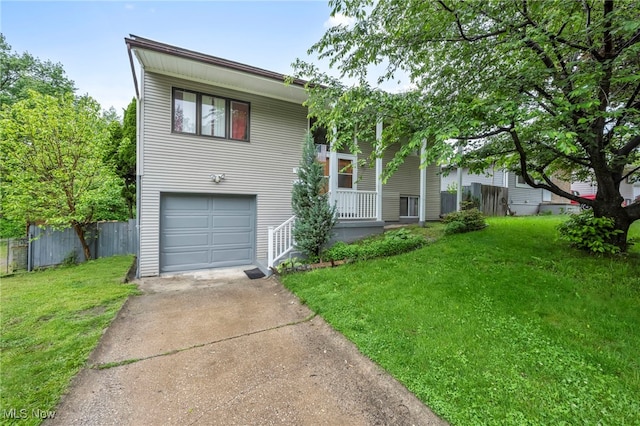 1654 Vicgross Ave, Akron, OH 44310 - raised ranch featuring concrete driveway and a garage