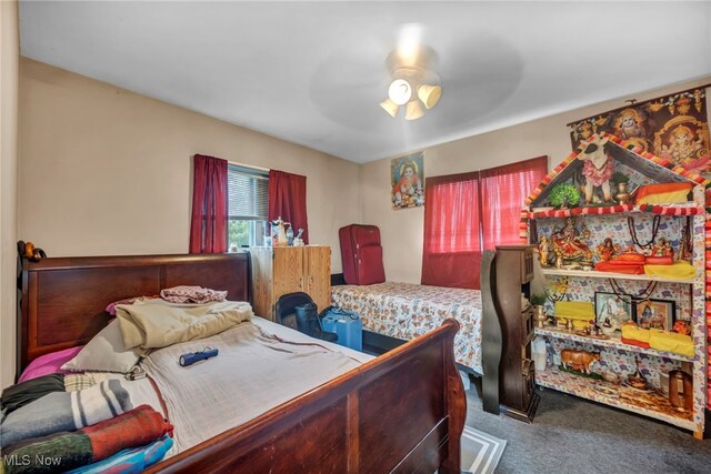 1654 Vicgross Ave, Akron, OH 44310 - carpeted bedroom featuring ceiling fan