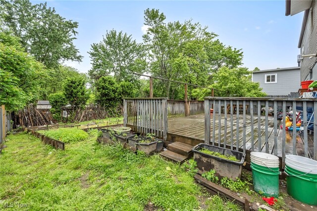 1654 Vicgross Ave, Akron, OH 44310 - view of yard featuring a vegetable garden and a deck