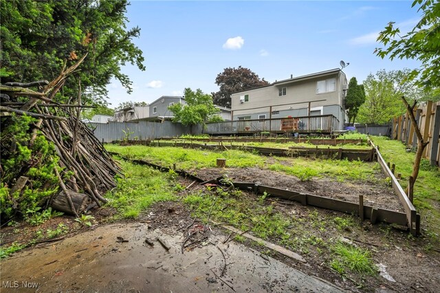 1654 Vicgross Ave, Akron, OH 44310 - fenced backyard featuring a garden