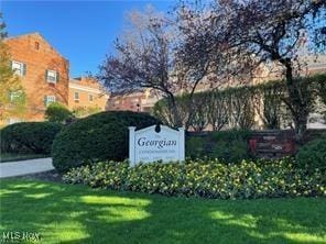 15875 Van Aken Blvd Unit 104C, Shaker Heights, OH 44120 - community sign with a yard