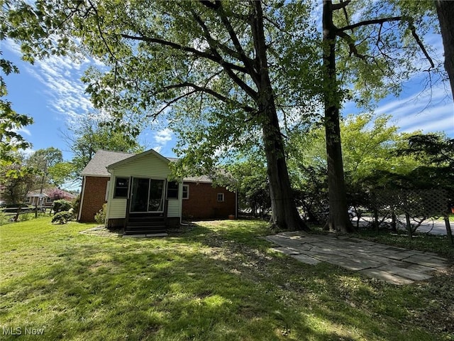 1089 Homestead Rd, South Euclid, OH 44121 - view of grassy yard featuring entry steps