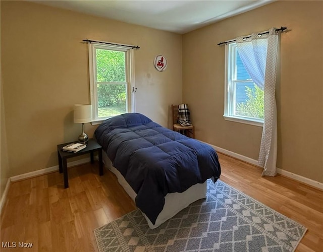 1089 Homestead Rd, South Euclid, OH 44121 - bedroom featuring light wood-type flooring and baseboards