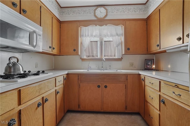 1783 Depot Rd, Salem, OH 44460 - kitchen featuring white appliances, a sink, light countertops, and brown cabinets