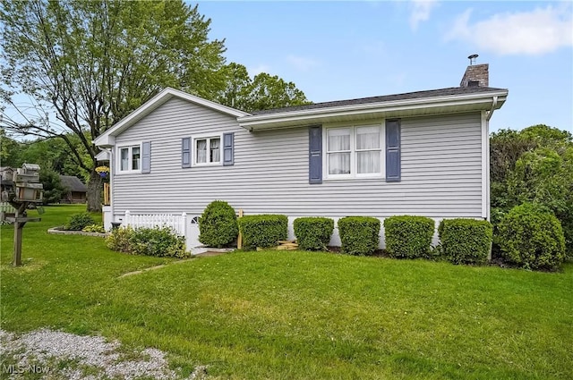 1783 Depot Rd, Salem, OH 44460 - view of side of home with a chimney and a yard