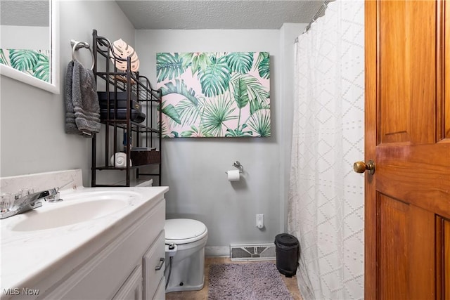 2445 Pigeon Run Rd SW, Massillon, OH 44647 - bathroom with vanity, a textured ceiling, toilet, and a shower with curtain