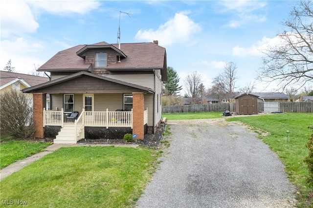 2445 Pigeon Run Rd SW, Massillon, OH 44647 - bungalow-style house with a porch, a chimney, and driveway