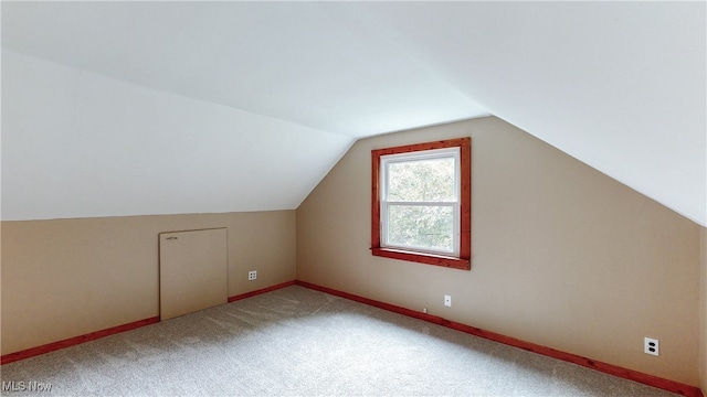 2364 Suncrest Dr, Cuyahoga Falls, OH 44221 - additional living space with lofted ceiling, carpet flooring, and baseboards