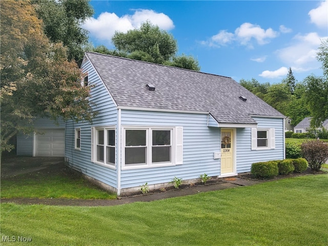 2364 Suncrest Dr, Cuyahoga Falls, OH 44221 - view of front facade with roof with shingles, a front lawn, a garage, and driveway