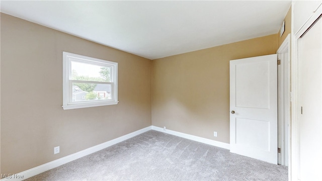 2364 Suncrest Dr, Cuyahoga Falls, OH 44221 - unfurnished room with light colored carpet and baseboards
