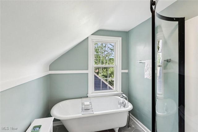3945 Meadowbrook Blvd, University Heights, OH 44118 - full bath with lofted ceiling, a freestanding tub, baseboards, and tile patterned floors