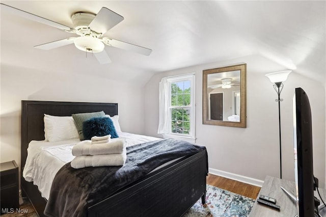 3945 Meadowbrook Blvd, University Heights, OH 44118 - bedroom featuring lofted ceiling, wood finished floors, ceiling fan, and baseboards