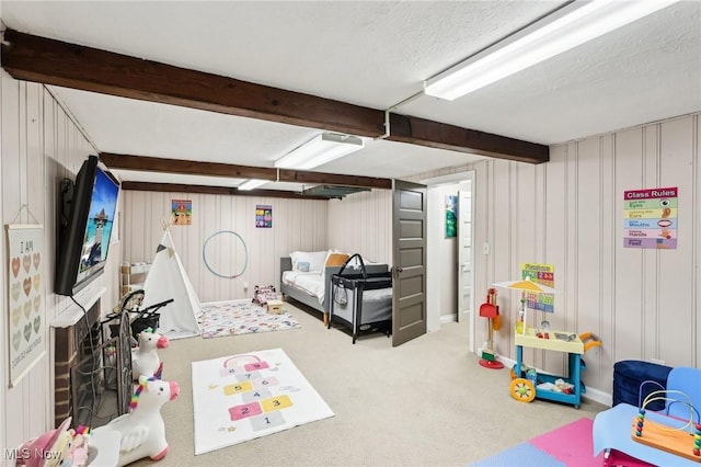 3945 Meadowbrook Blvd, University Heights, OH 44118 - playroom featuring carpet floors and beam ceiling