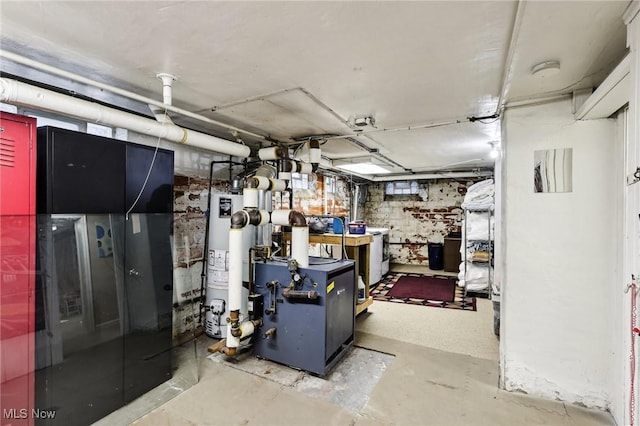 3945 Meadowbrook Blvd, University Heights, OH 44118 - basement with gas water heater and a heating unit