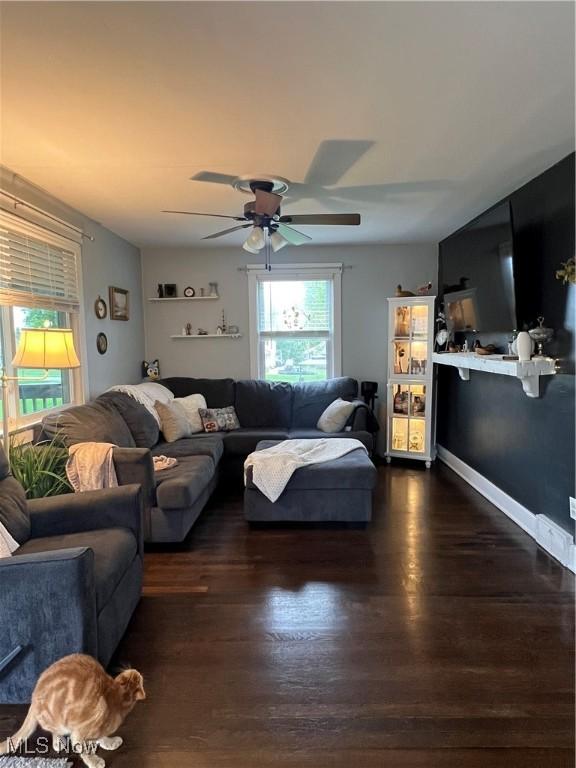 724 8th St, Struthers, OH 44471 - living area featuring a ceiling fan and dark wood finished floors