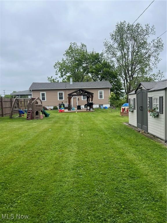 724 8th St, Struthers, OH 44471 - view of yard with a playground and a gazebo