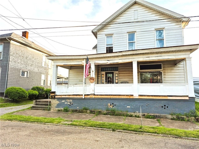 308 10th St, Wellsville, OH 43968 - view of front of property featuring a porch