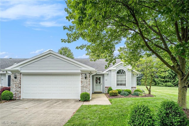 194 Lisa Ann Dr, Huron, OH 44839 - ranch-style home with a garage, concrete driveway, a front yard, brick siding, and roof with shingles