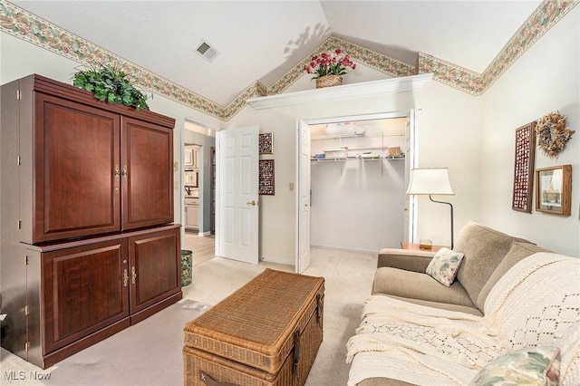 194 Lisa Ann Dr, Huron, OH 44839 - living area with light carpet and vaulted ceiling