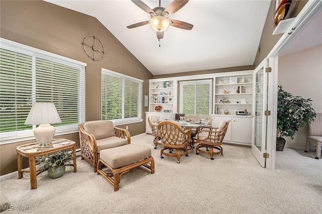 194 Lisa Ann Dr, Huron, OH 44839 - carpeted dining space with ceiling fan, lofted ceiling, and baseboards