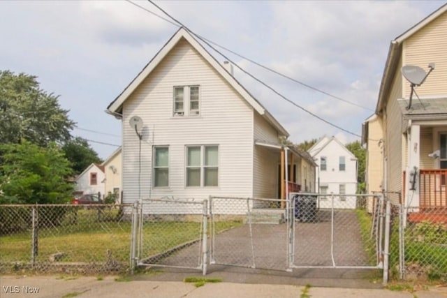 1571 E 45th St, Cleveland, OH 44103 - view of front of home featuring a gate