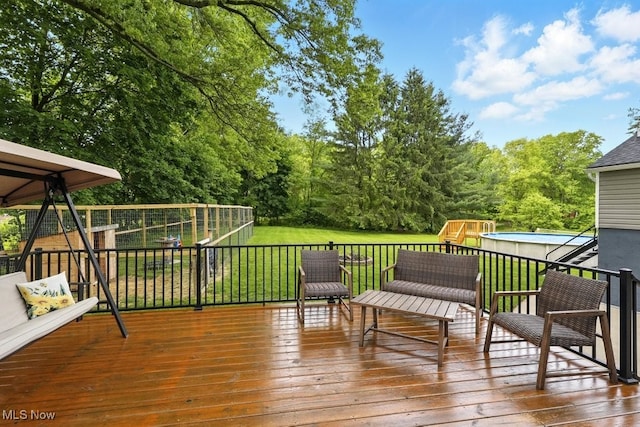 3136 Ellet Ave, Akron, OH 44312 - wooden terrace featuring a playground and a lawn