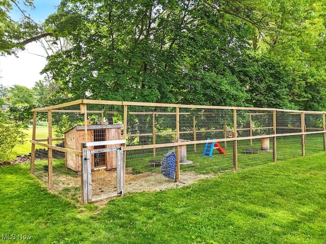 3136 Ellet Ave, Akron, OH 44312 - view of community featuring exterior structure, a lawn, and an outdoor structure