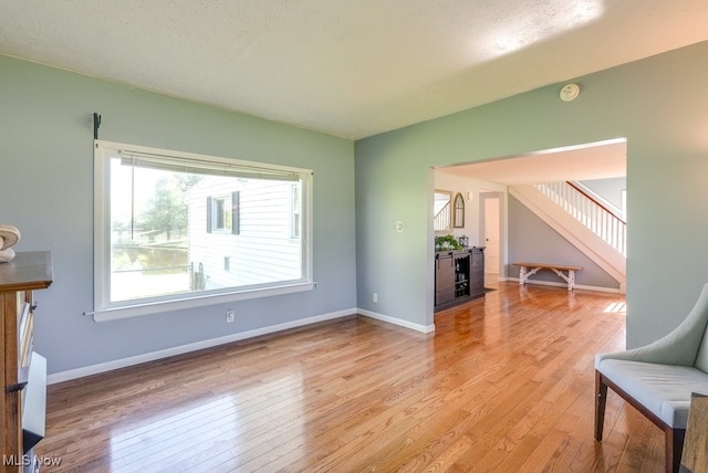 869 State Route 303, Streetsboro, OH 44241 - living area featuring light wood finished floors and baseboards