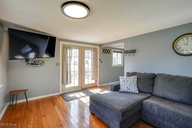 869 State Route 303, Streetsboro, OH 44241 - living room with hardwood / wood-style flooring, baseboards, and french doors