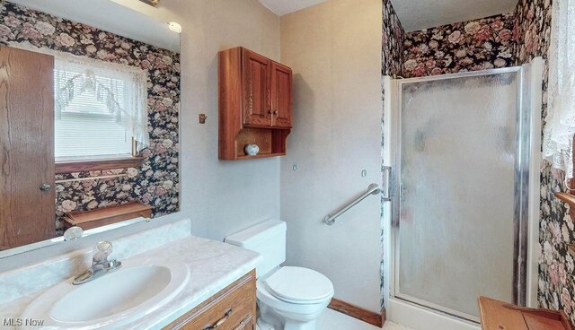 16000 Louisville St, Homeworth, OH 44634 - full bathroom featuring vanity, a stall shower, and toilet