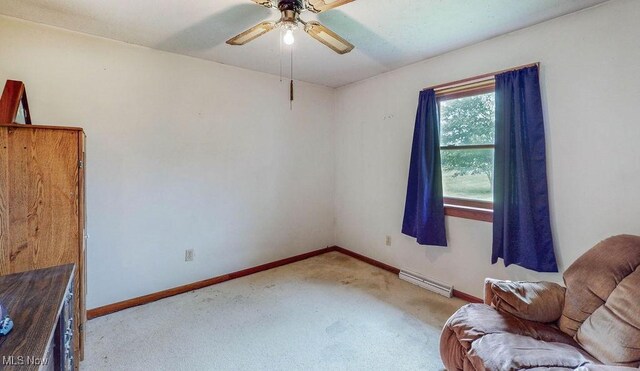 16000 Louisville St, Homeworth, OH 44634 - sitting room featuring carpet floors, baseboards, and a ceiling fan