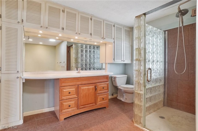 4017 Bellaire Ln, Peninsula, OH 44264 - full bath with a shower stall, vanity, tile patterned flooring, baseboards, and toilet