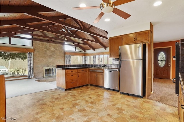 4017 Bellaire Ln, Peninsula, OH 44264 - kitchen with stainless steel appliances, wooden ceiling, healthy amount of natural light, a sink, and a peninsula