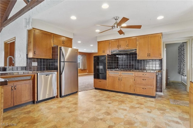 4017 Bellaire Ln, Peninsula, OH 44264 - kitchen featuring appliances with stainless steel finishes, a warming drawer, ceiling fan, tile countertops, and under cabinet range hood