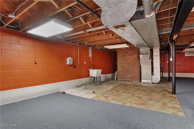 4017 Bellaire Ln, Peninsula, OH 44264 - unfinished below grade area with heating unit and a sink