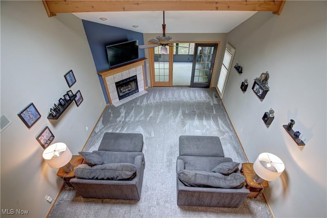 3936 Burgundy Bay Blvd W, Medina, OH 44256 - living area featuring carpet flooring, ceiling fan, and a fireplace