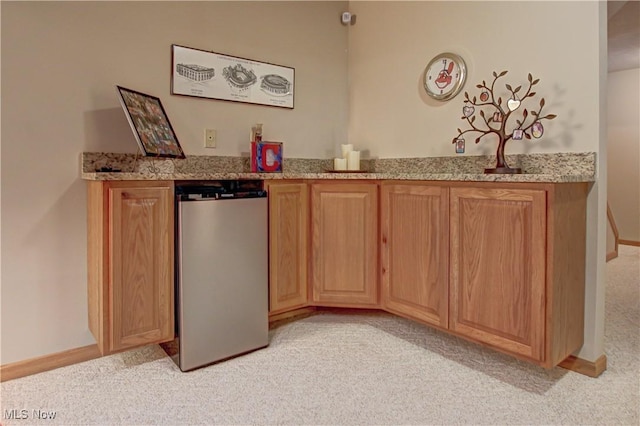 3936 Burgundy Bay Blvd W, Medina, OH 44256 - indoor bar with light colored carpet and fridge
