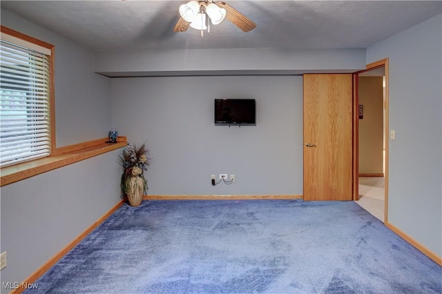 3936 Burgundy Bay Blvd W, Medina, OH 44256 - empty room featuring a ceiling fan, carpet floors, and baseboards