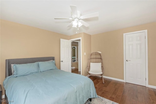 2381 Charney Rd, University Heights, OH 44118 - bedroom featuring wood finished floors, baseboards, and a ceiling fan